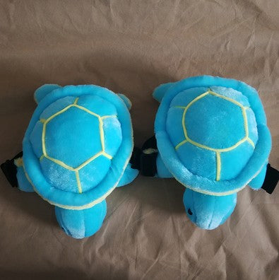 Blue turtle knee pads for skiing and snowboarding, one pair
